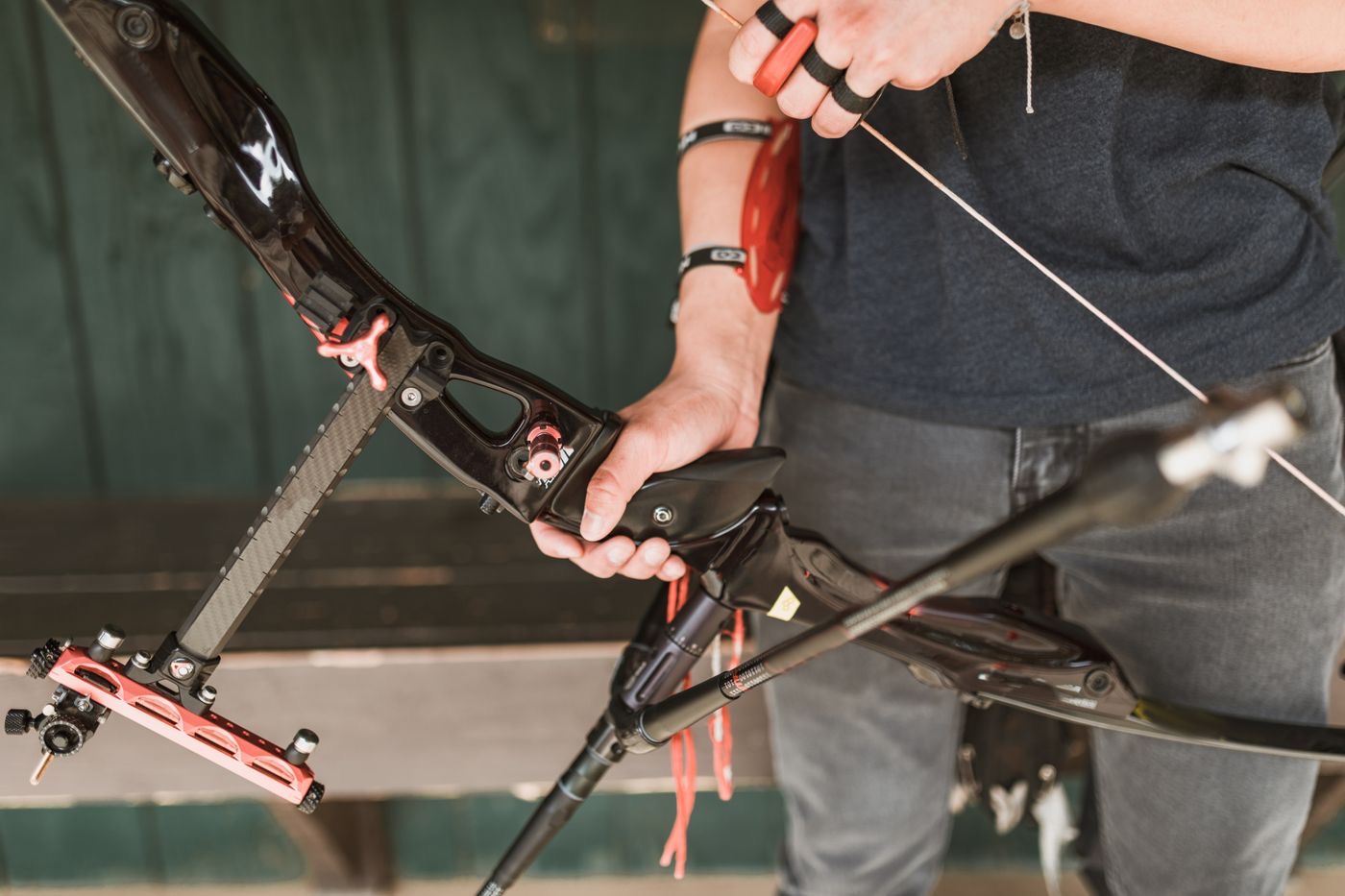 Focused archer preparing the bow