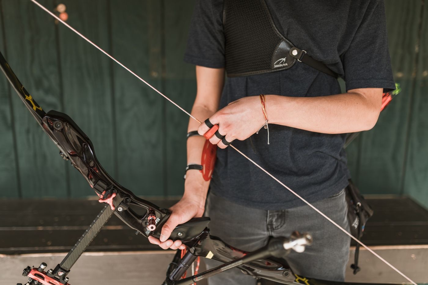 Focused archer athlete before the shot